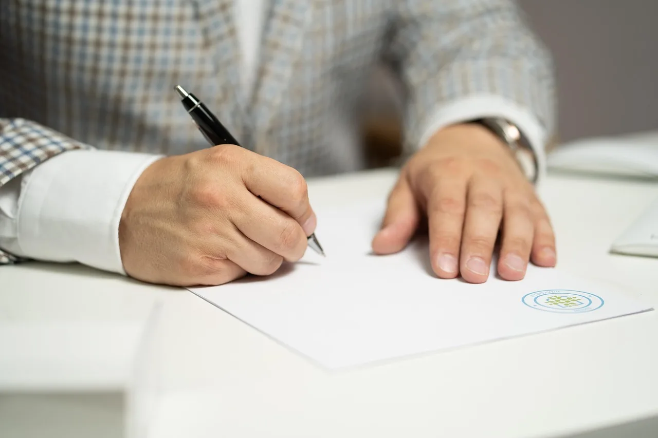 man, sign, paper, write, document, contract, signing, agreement, signature, signing document, signing contract, signing paper, sign, contract, contract, contract, contract, contract, signing, agreement, signature, signature. What to check in a newsletter sponsorship contract before signing