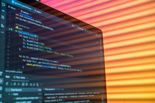 Close-up of computer code on a screen illuminated by warm lighting patterns, creating an artistic tech vibe. SPF, DKIM, and DMARC rollout for a US newsletter: stages and timing